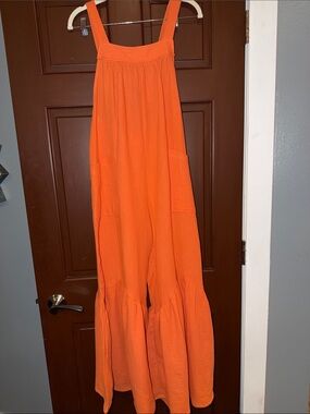 Orange Wide-Leg Jumpsuit with Ruffle Hem